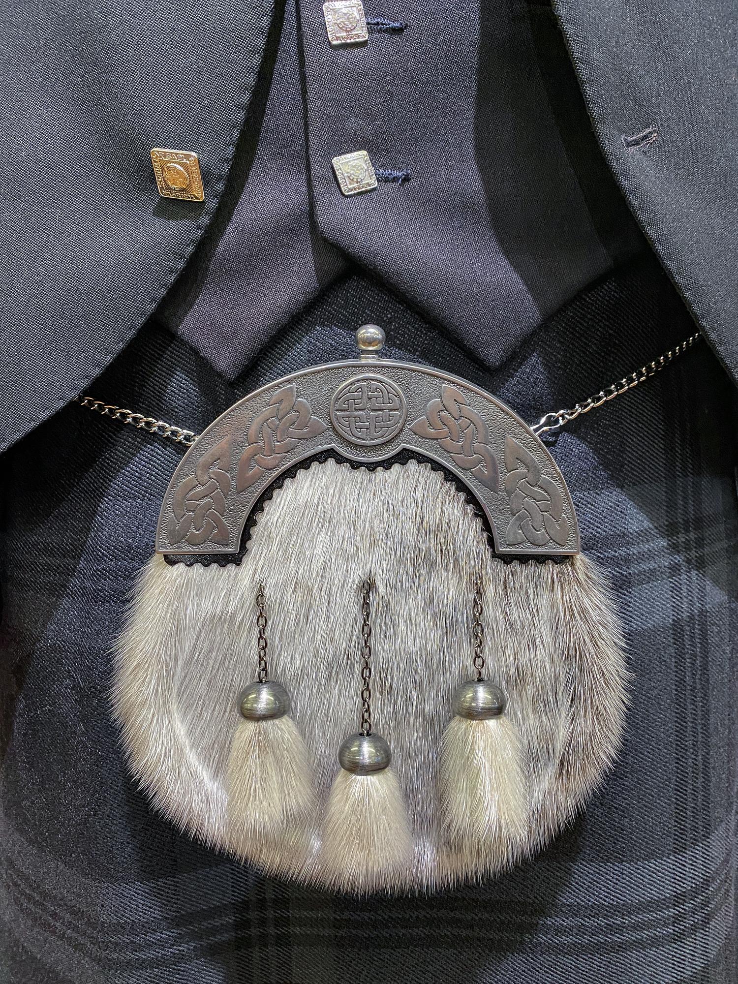 Worn jacket patch with faded threads